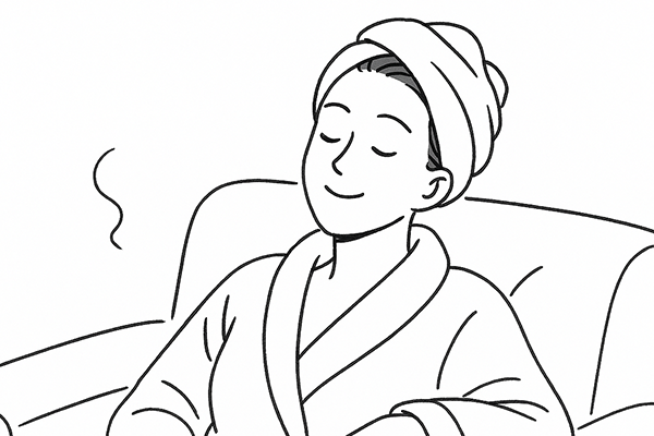 入浴後にリラックスしている女性